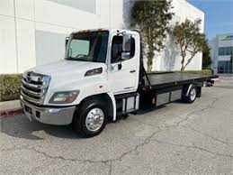 Low Profile Flatbed Towing business image